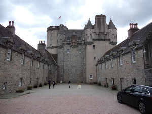 Castle Fraser courtyard. Easy to see the original central keep (with filled high entrance) and the later additions.